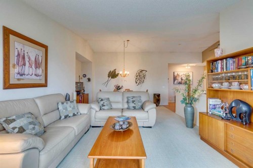 8 Douglas Woods View Se, Calgary, AB - Indoor Photo Showing Living Room