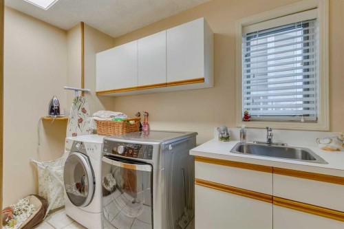 8 Douglas Woods View Se, Calgary, AB - Indoor Photo Showing Laundry Room