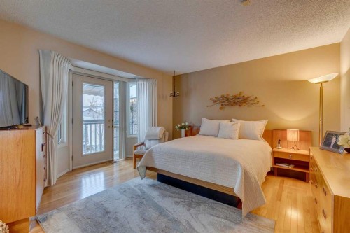 8 Douglas Woods View Se, Calgary, AB - Indoor Photo Showing Bedroom