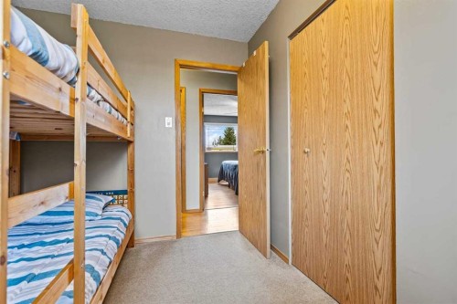 302 Stuart Street, Blackie, AB - Indoor Photo Showing Bedroom