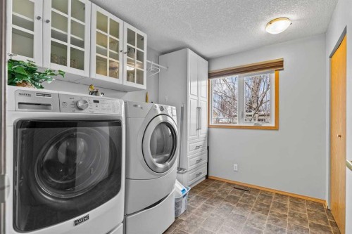 302 Stuart Street, Blackie, AB - Indoor Photo Showing Laundry Room