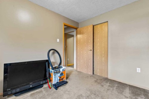 302 Stuart Street, Blackie, AB - Indoor Photo Showing Other Room