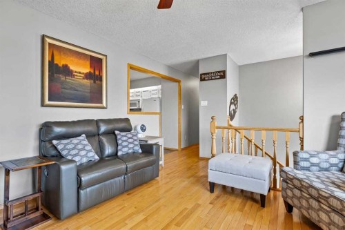 302 Stuart Street, Blackie, AB - Indoor Photo Showing Living Room