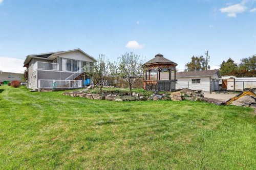 1212 15 Avenue, Didsbury, AB - Outdoor With Deck Patio Veranda