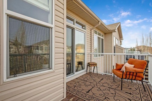 1907 Riverside Drive Nw, High River, AB - Indoor Photo Showing Bedroom