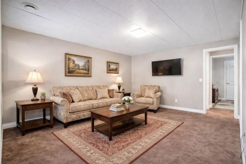 1907 Riverside Drive Nw, High River, AB - Indoor Photo Showing Living Room