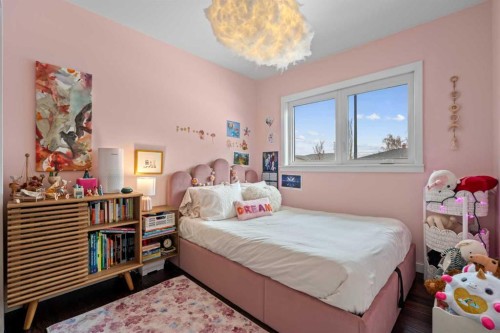 25 Foxwell Road Se, Calgary, AB - Indoor Photo Showing Bedroom