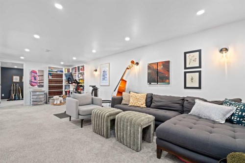 25 Foxwell Road Se, Calgary, AB - Indoor Photo Showing Living Room
