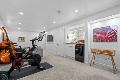 25 Foxwell Road Se, Calgary, AB - Indoor Photo Showing Gym Room