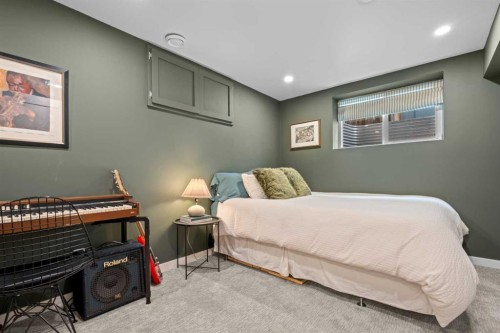 25 Foxwell Road Se, Calgary, AB - Indoor Photo Showing Bedroom