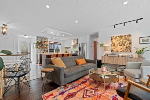 25 Foxwell Road Se, Calgary, AB - Indoor Photo Showing Living Room