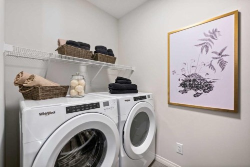 135 Huxland Road Ne, Calgary, AB - Indoor Photo Showing Laundry Room