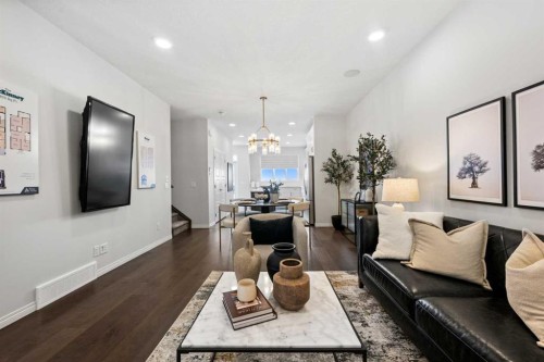 135 Huxland Road Ne, Calgary, AB - Indoor Photo Showing Living Room