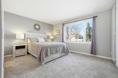 14775 Deer Ridge Drive Se, Calgary, AB - Indoor Photo Showing Bedroom