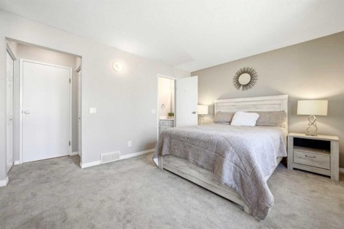 14775 Deer Ridge Drive Se, Calgary, AB - Indoor Photo Showing Bedroom