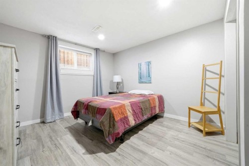 14775 Deer Ridge Drive Se, Calgary, AB - Indoor Photo Showing Bedroom