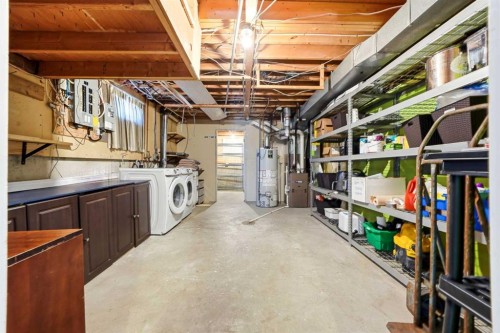14775 Deer Ridge Drive Se, Calgary, AB - Indoor Photo Showing Laundry Room