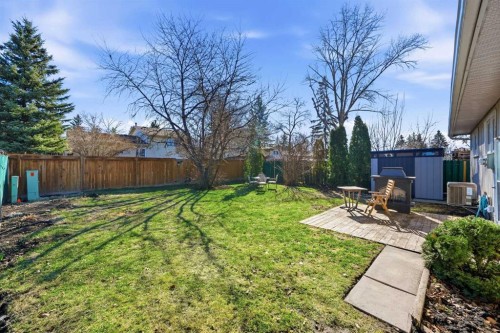 14775 Deer Ridge Drive Se, Calgary, AB - Outdoor With Backyard