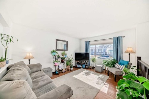 3772 Dover Ridge Drive Se, Calgary, AB - Indoor Photo Showing Living Room