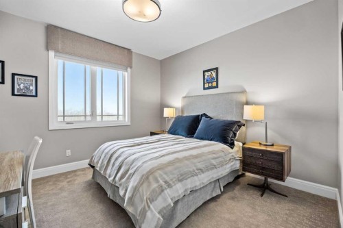 11 Mckendrick Point, Rural Rocky View County, AB - Indoor Photo Showing Bedroom