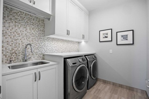 11 Mckendrick Point, Rural Rocky View County, AB - Indoor Photo Showing Laundry Room