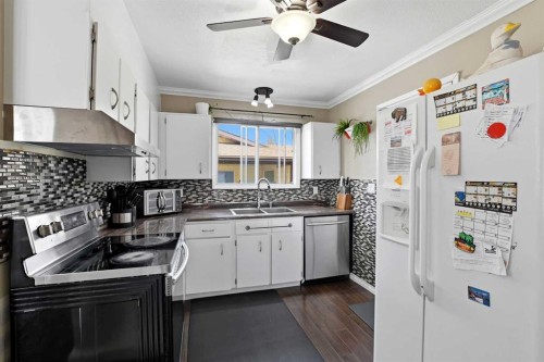 5218 Silverthorn Road, Olds, AB - Indoor Photo Showing Kitchen With Double Sink