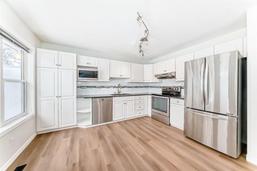 155 Prominence Heights Sw, Calgary, AB - Indoor Photo Showing Kitchen With Stainless Steel Kitchen With Upgraded Kitchen