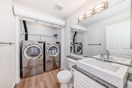 155 Prominence Heights Sw, Calgary, AB - Indoor Photo Showing Laundry Room