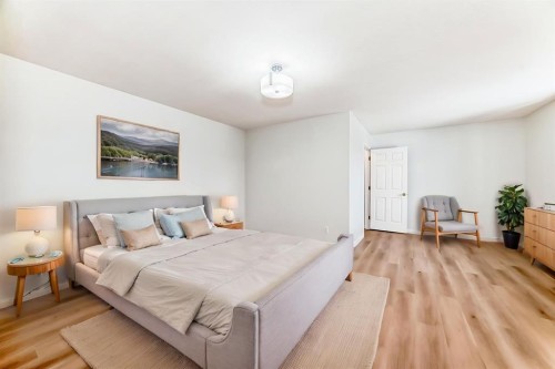 155 Prominence Heights Sw, Calgary, AB - Indoor Photo Showing Bedroom