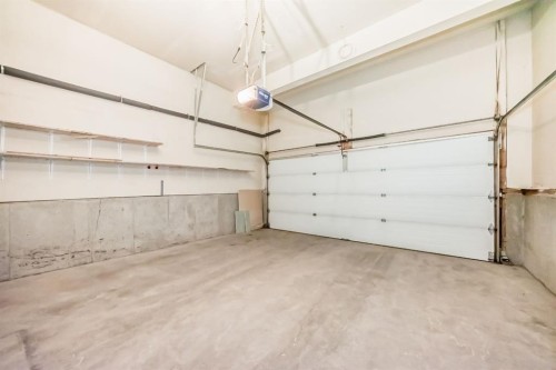 155 Prominence Heights Sw, Calgary, AB - Indoor Photo Showing Garage