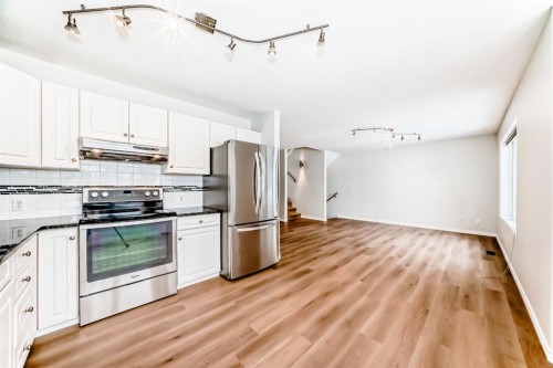 155 Prominence Heights Sw, Calgary, AB - Indoor Photo Showing Kitchen With Stainless Steel Kitchen