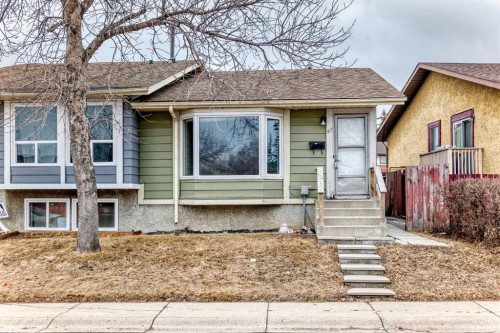47 Templemont Drive Ne, Calgary, AB - Outdoor With Facade