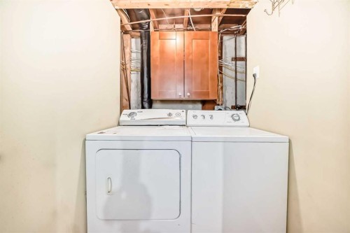 47 Templemont Drive Ne, Calgary, AB - Indoor Photo Showing Laundry Room