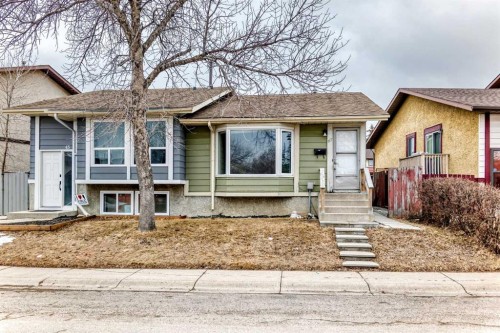 47 Templemont Drive Ne, Calgary, AB - Outdoor With Facade