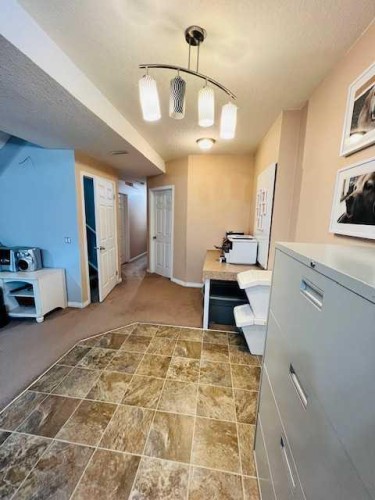 125 Saddlebrook Circle Ne, Calgary, AB - Indoor Photo Showing Other Room