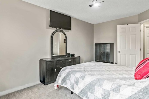 18 Copperstone Link Se, Calgary, AB - Indoor Photo Showing Bedroom