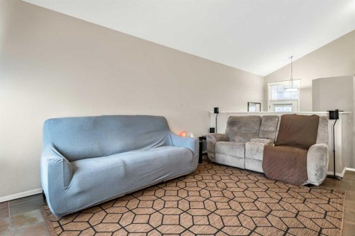 18 Copperstone Link Se, Calgary, AB - Indoor Photo Showing Living Room