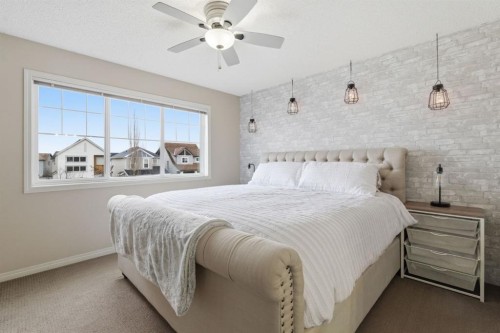 155 Copperpond Road Se, Calgary, AB - Indoor Photo Showing Bedroom