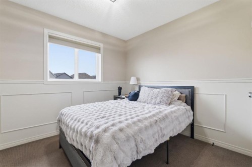 155 Copperpond Road Se, Calgary, AB - Indoor Photo Showing Bedroom