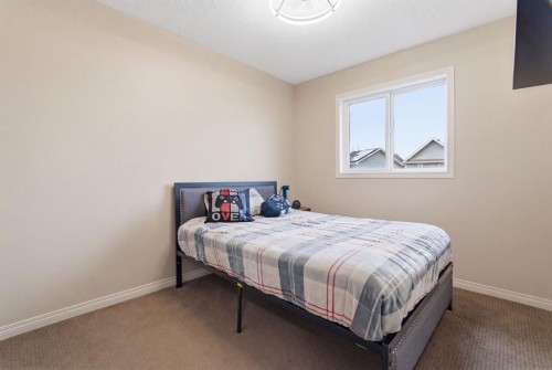 155 Copperpond Road Se, Calgary, AB - Indoor Photo Showing Bedroom