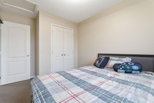 155 Copperpond Road Se, Calgary, AB - Indoor Photo Showing Bedroom