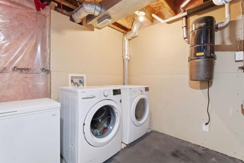 155 Copperpond Road Se, Calgary, AB - Indoor Photo Showing Laundry Room