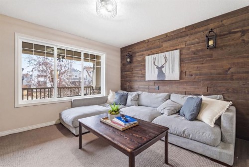 155 Copperpond Road Se, Calgary, AB - Indoor Photo Showing Living Room