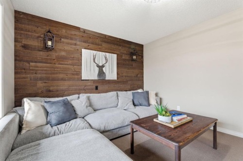 155 Copperpond Road Se, Calgary, AB - Indoor Photo Showing Living Room