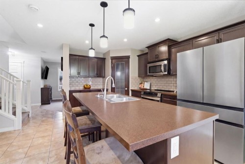 155 Copperpond Road Se, Calgary, AB - Indoor Photo Showing Kitchen With Stainless Steel Kitchen With Double Sink With Upgraded Kitchen