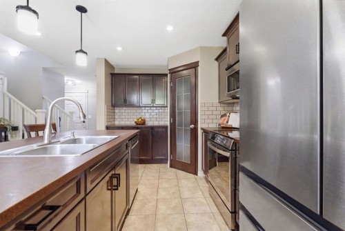 155 Copperpond Road Se, Calgary, AB - Indoor Photo Showing Kitchen With Stainless Steel Kitchen With Double Sink With Upgraded Kitchen