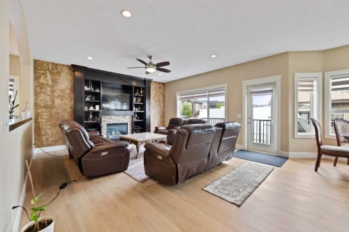 150 Saddlelake Grove Ne, Calgary, AB - Indoor Photo Showing Living Room With Fireplace