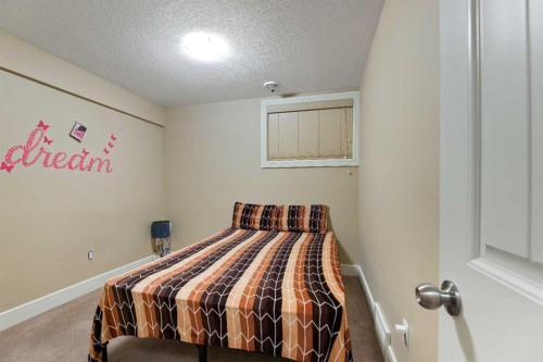 150 Saddlelake Grove Ne, Calgary, AB - Indoor Photo Showing Bedroom