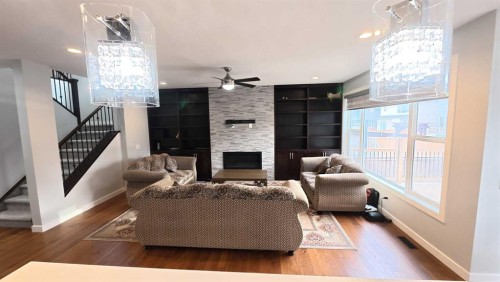 144 Red Embers Square Ne, Calgary, AB - Indoor With Fireplace