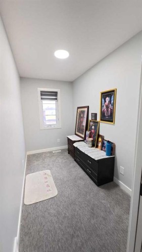 144 Red Embers Square Ne, Calgary, AB - Indoor Photo Showing Other Room